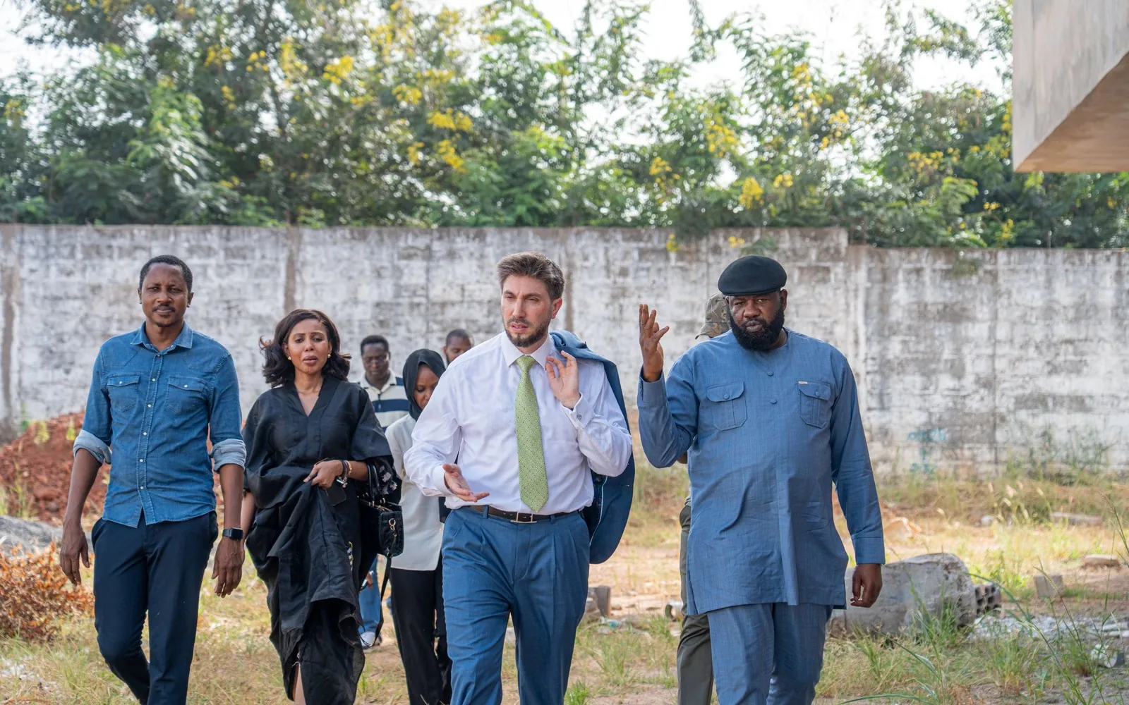 Daniel Seal walking a site in The Gambia with his local partners