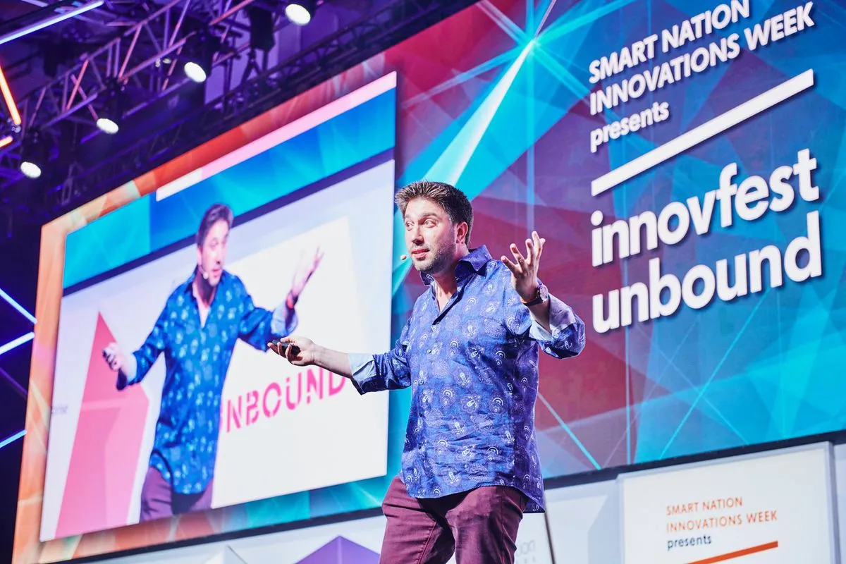 Daniel Seal speaking at Innovfest Unbound in Singapore